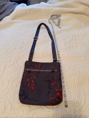 Haiku Dark Gray Crossbody Bag with Red Floral Print
